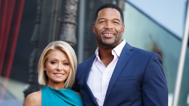 Television host Kelly Ripa (L) and Michael Strahan attend the Hollywood Walk of Fame