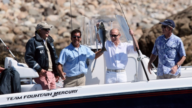 An image of President George W. Bush and Russian President Vladimir Putin's fishing trip in 2007.
