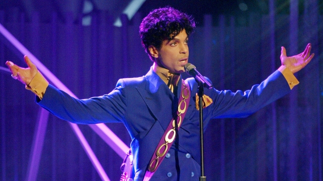 Grammy and Oscar-winning recording artist Prince performs the song 'Purple Rain.'