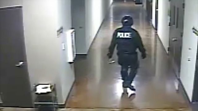 A still from surveillance footage showing a possible suspect in the murder of Missy Bevers.