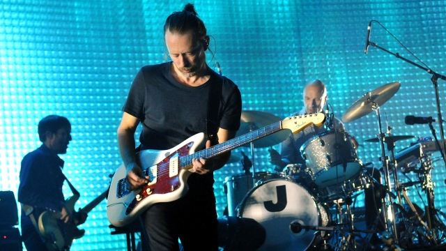 Colin Greenwood, Thom Yorke and Philip Selway of Radiohead perform live on stage at 02 Arena on October 8, 2012 in London.