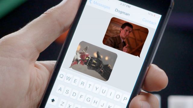 A man looks at GIFs in his iPhone's iMessage app.