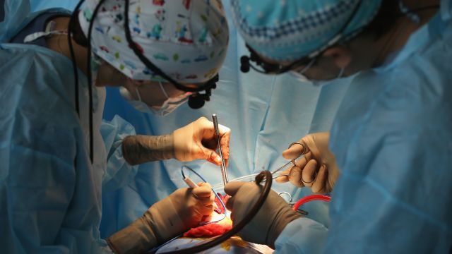 Cardiac surgeons perform open-heart surgery on nearly-four-year-old Rostislav Sokolov on March 31, 2016 in Kharkov, Ukraine.