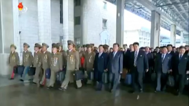 North Korean officials arriving for the seventh Workers' Party Conference.