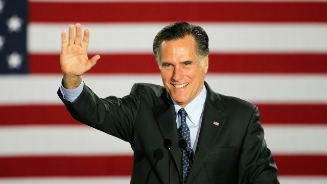 Photo of Mitt Romney on the left and William Kristol on the right.