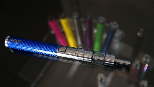 E-cigarette vaporizers are displayed at a store.