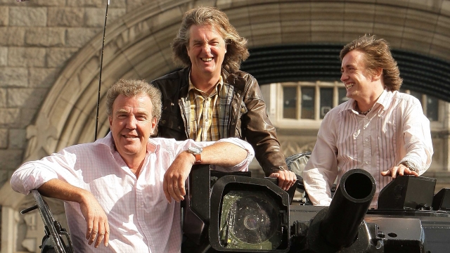 Television presenters Jeremy Clarkson, Richard Hammond and James May cross Tower Bridge on a military vehicle on September 1,