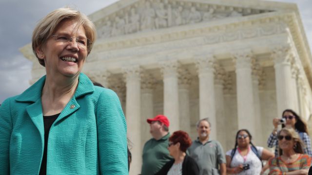 Sen. Elizabeth Warren (D-MA) joins fellow Senate Democrats for a news conference in front of the Supreme Court.