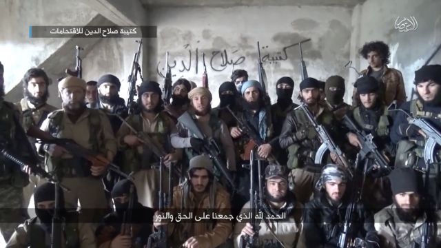 A bunch of ISIS fighters from an ISIS propaganda video.
