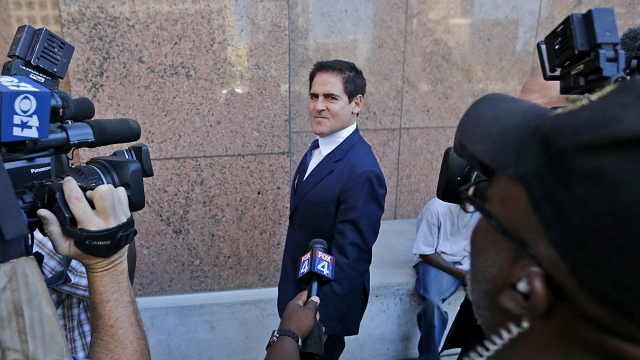 Mark Cuban speaks with the media after leaving the Earle Cabell Federal Building and Courthouse in downtown Dallas.