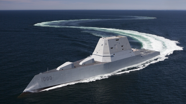 The 610-foot gray destroyer glides through the Atlantic Ocean.