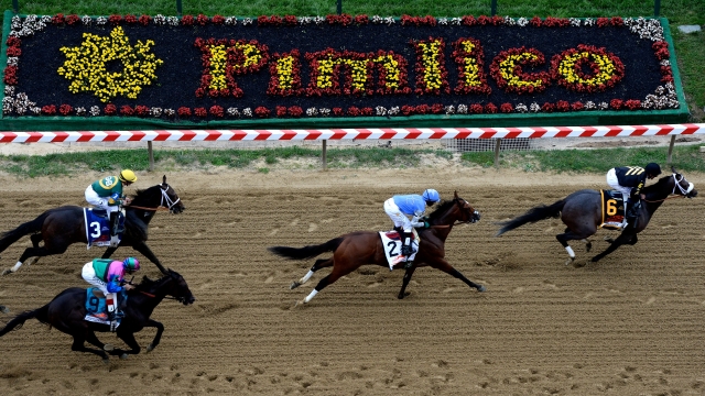 Horses run on at Pimlico Race Course in the 138th running of the Preakness Stakes