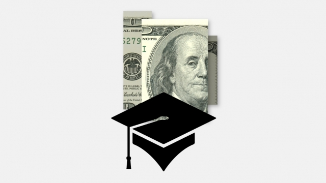 A graduation cap on top of money.