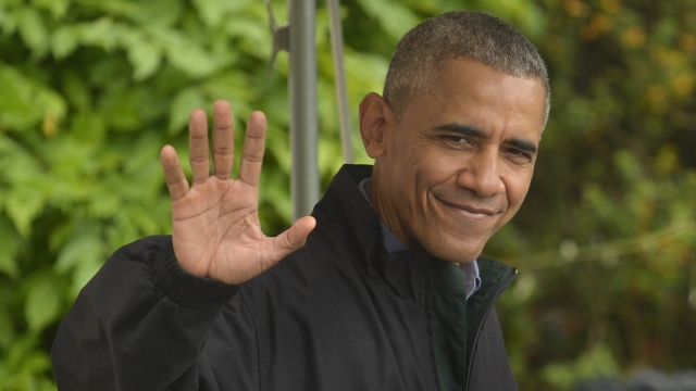 President Obama waves as he leaves for trip to Asia.