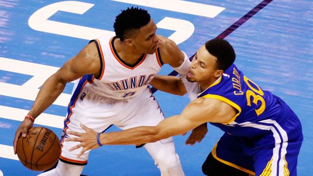 Russell Westbrook #0 of the Oklahoma City Thunder drives against Stephen Curry #30 of the Golden State Warriors.