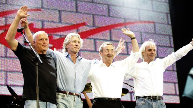 Pink Floyd members wave to fans after show.
