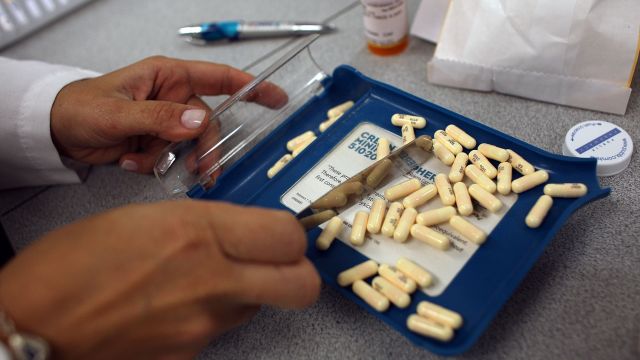 A pharmacist separates antibiotics.
