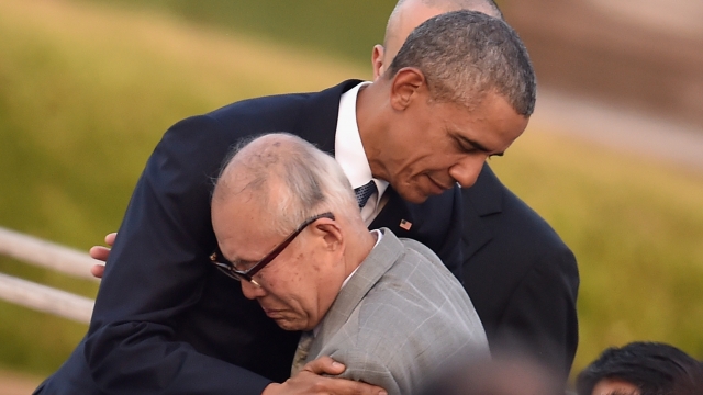 President Barack Obama hugs a survivor of the Hiroshima bombing.