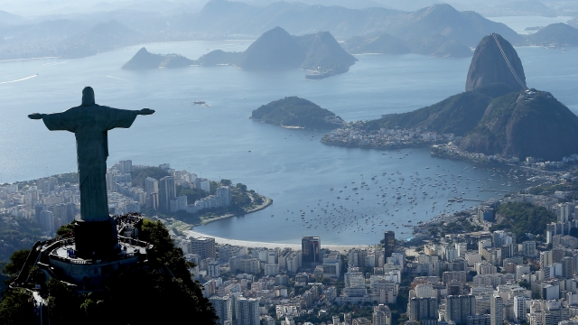 Aerial view of Rio de Janeiro, including Christ the Redeemer, Flamengo Beach, the Sugar Loaf and Guanabara Bay.