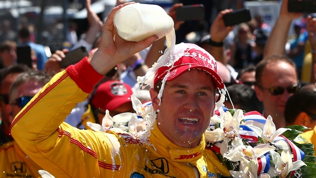Ryan Hunter-Reay pours milk over his head after winning the 98th running of the Indianapolis 500 in 2014.