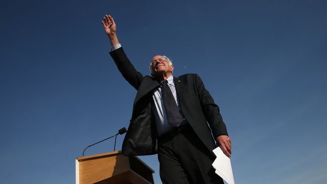 Bernie Sanders waves to supporters.