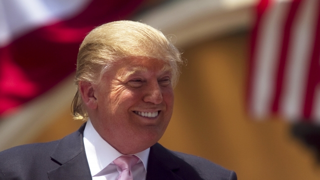Donald Trump smiles at supporters