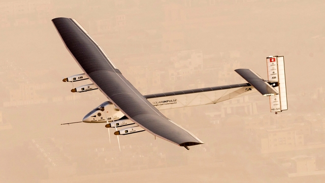 Solar Impulse 2, a solar-powered airplane, takes flight from Abu Dhabi as it begins its historic round-the-world journey.