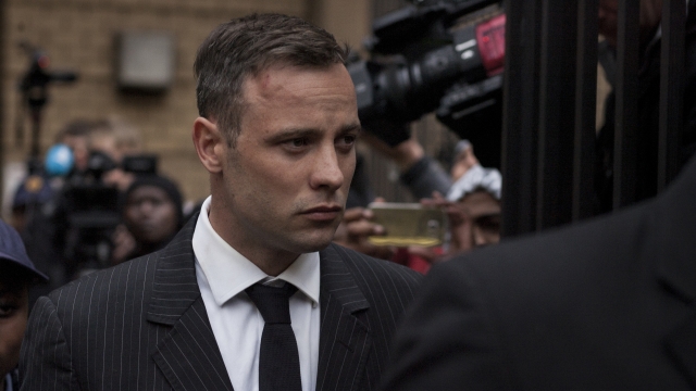 Oscar Pistorius walks to sentencing hearing.
