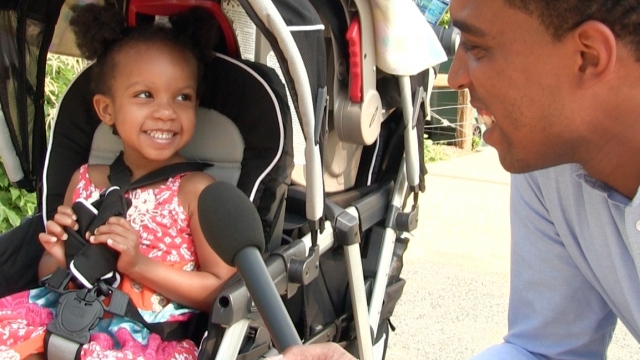 A little girl speaks to Newsy about her dad.
