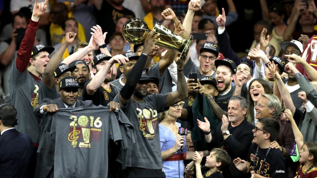 Cleveland Cavaliers hoist NBA championship trophy after Game 7 win.