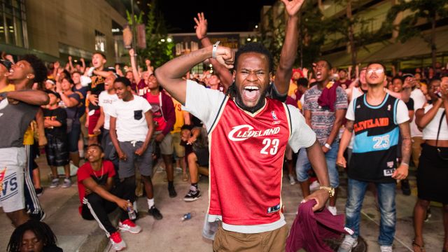 Fans react to a play during the Cleveland Cavaliers' NBA Finals Game 7 watch party at Quicken Loans Arena on June 19, 2016.