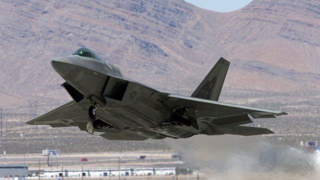 A United States Air Force F-22 Raptor takes off from Nellis Air Force Base.