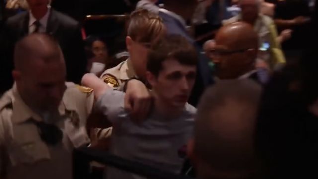 Michael Steven Sandford being arrested at a Donald Trump rally in Las Vegas.