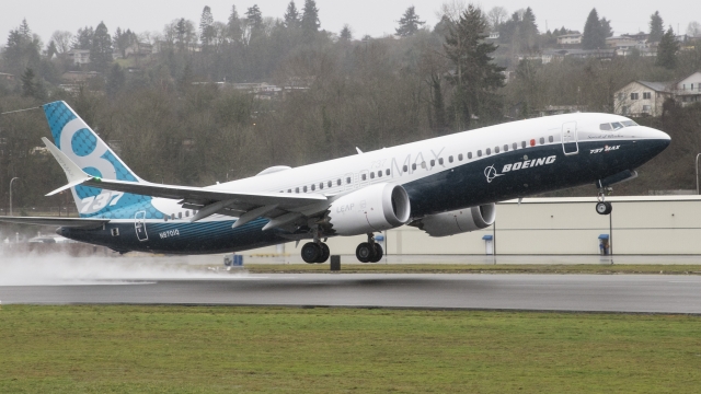 A Boeing 737 MAX 8 airliner lifts off for its first flight.