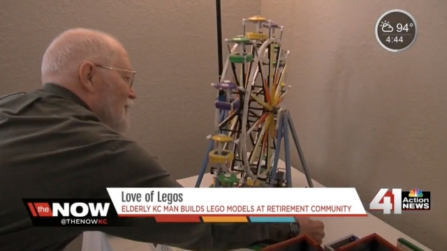Bill Fields showing off his Ferris wheel Lego model