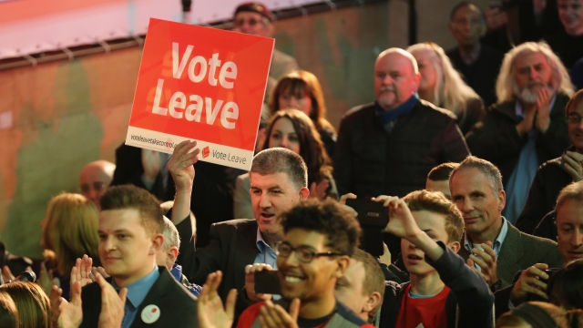 Vote Leave supporters wait for London Mayor Boris Johnson to address campaigners during a rally for the 'Vote Leave' campaign