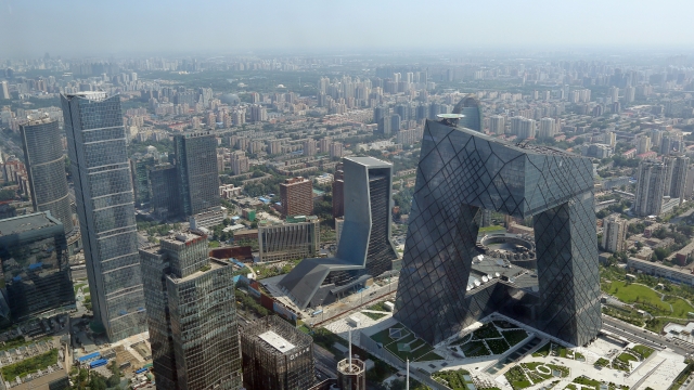 A general view shows the headquarter of China Central Television amid the Beijing skyline at central business district.