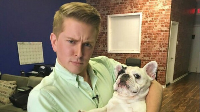 Newsy's Cody LaGrow with Manny the Frenchie