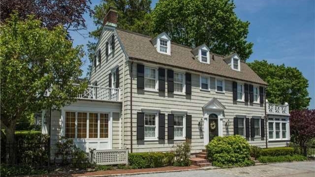 "The Amityville Horror" house is shown in a real estate listing.