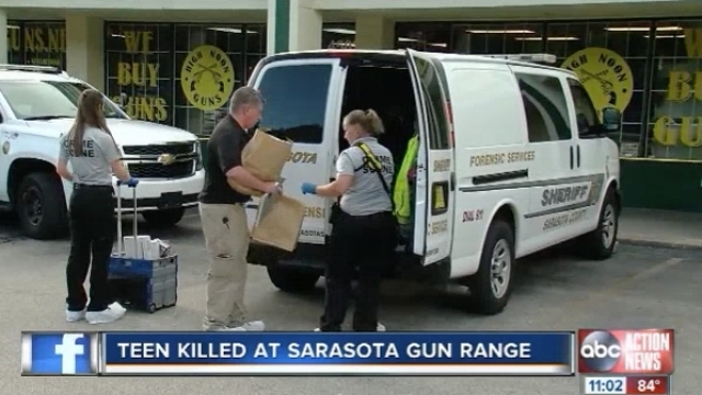 Sarasota County Sheriff's officer remove evidence from the High Noon Gun Range after a deadly accident.
