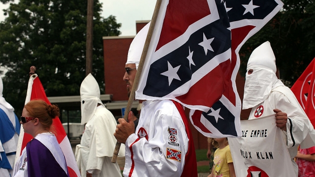 Members of the  Ku Klux Klan participate in the 11th Annual Nathan Bedford Forrest Birthday march