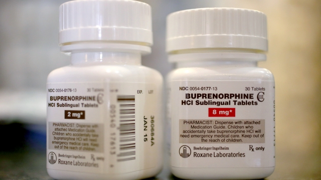 Bottles of the generic prescription pain medication Buprenorphine are seen in a pharmacy.