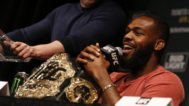 Jon Jones speaks at a press conference with UFC president Dana White at a media availability for UFC 200.
