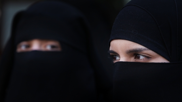Two women wearing Islamic niqab veils