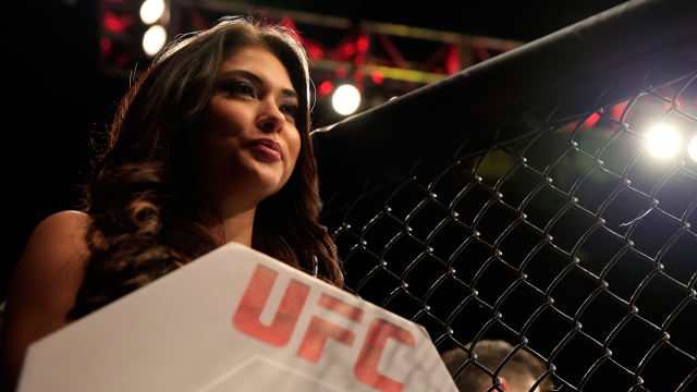 UFC Octagon Girl Arianny Celeste signals the beginning of a round.