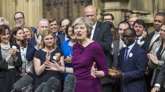 British Home Secretary and Conservative leadership contender Theresa May speaks to the media in front of supporters and MPs.