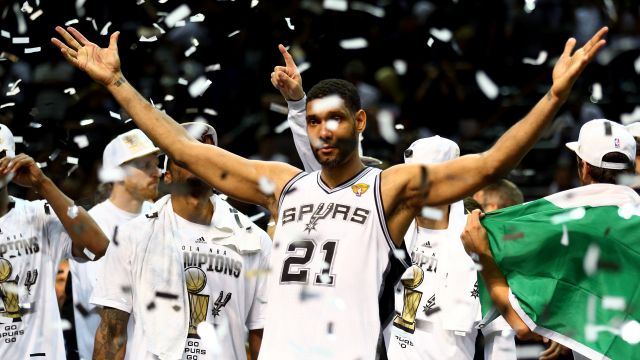 Tim Duncan #21 of the San Antonio Spurs celebrates after defeating the Miami Heat.