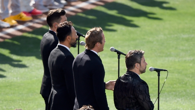 The Tenors, musicians based in British Columbia, perform "O Canada" prior to the 87th Annual MLB All-Star Game.