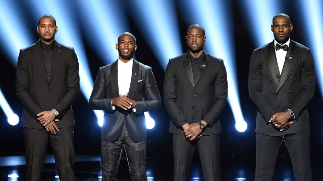 NBA players Carmelo Anthony, Chris Paul, Dwyane Wade and LeBron James speak onstage during the 2016 ESPYS.