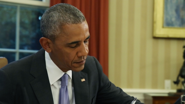 U.S.President Barack Obama signs a bill